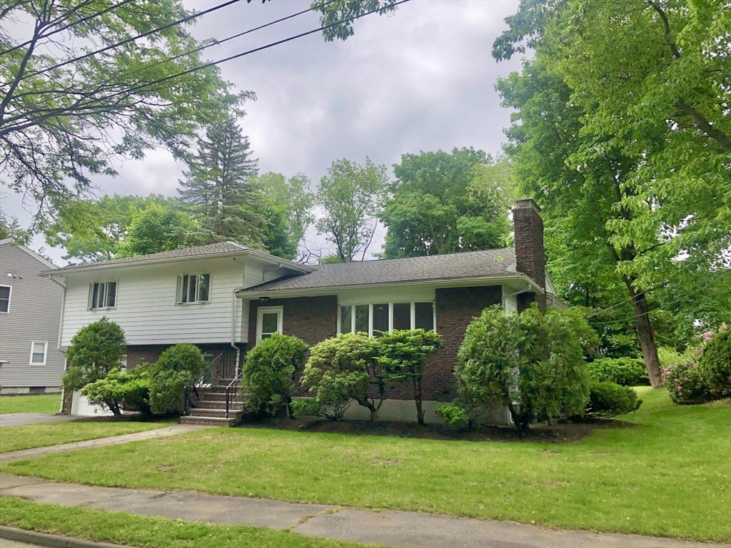 15 Sycamore Road Wakefield, MA 01880 - Photo 36 of 39 a view of a house with a garden