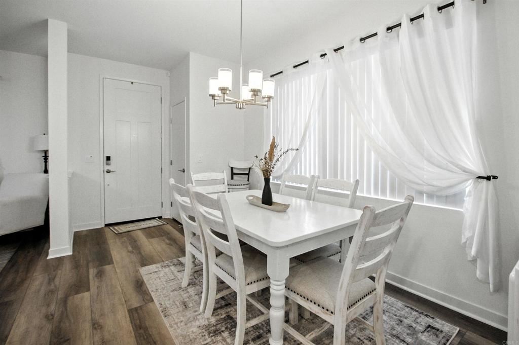 332 Seedling Way Fallbrook, CA 92028 - Photo 14 of 37 a view of a dining room with furniture and window