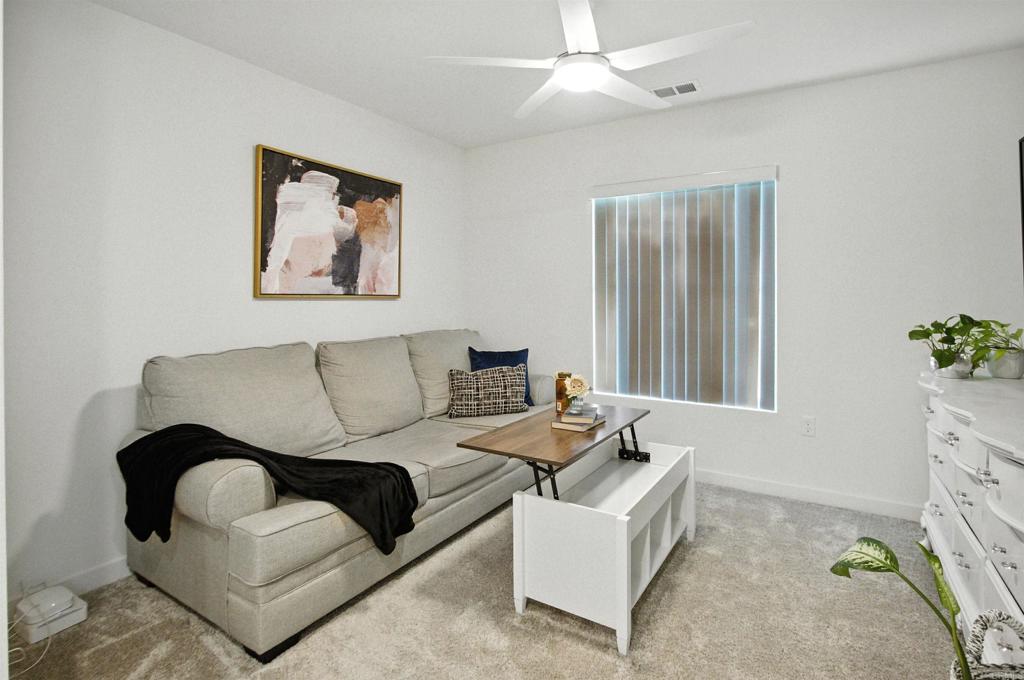 332 Seedling Way Fallbrook, CA 92028 - Photo 18 of 37 a living room with furniture and a potted plant