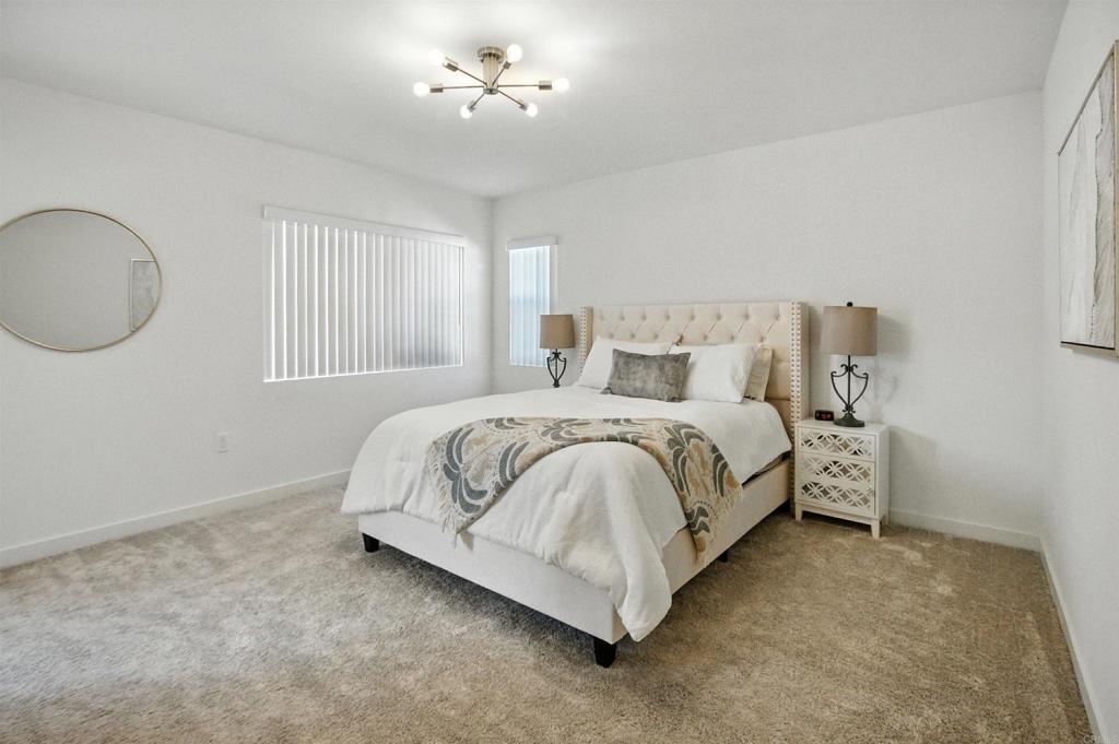 332 Seedling Way Fallbrook, CA 92028 - Photo 20 of 37 a bed sitting in a spacious bedroom next to a window