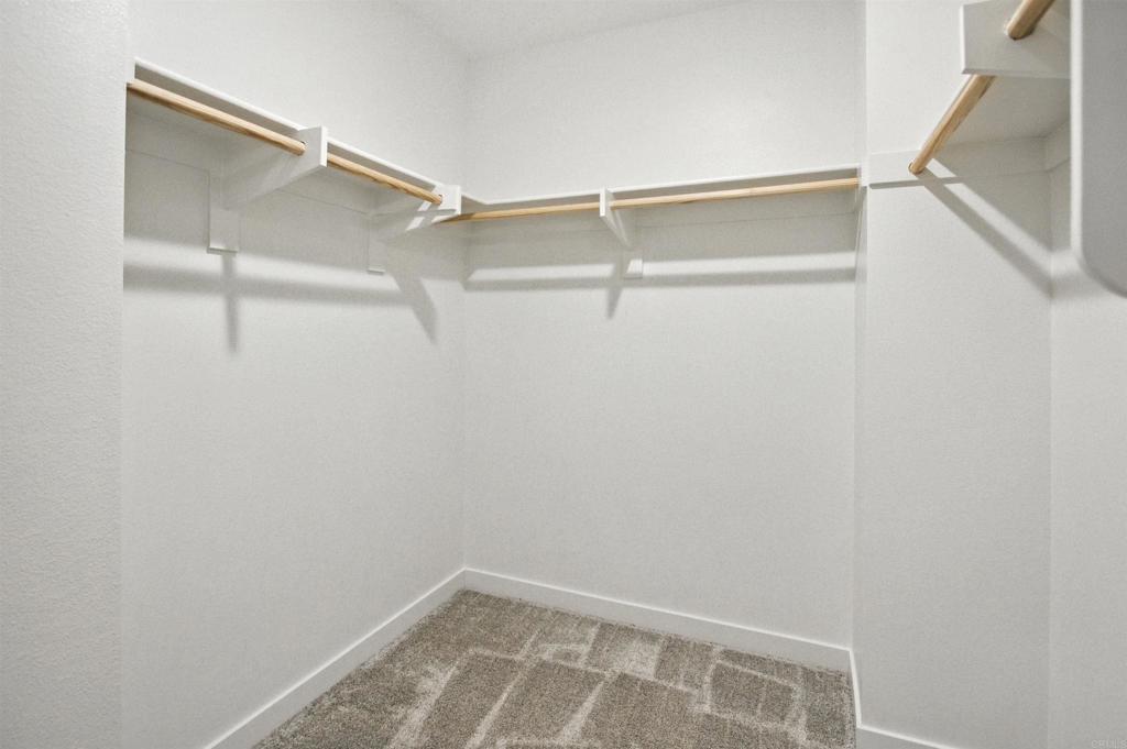 332 Seedling Way Fallbrook, CA 92028 - Photo 22 of 37 a view of an empty walk in closet