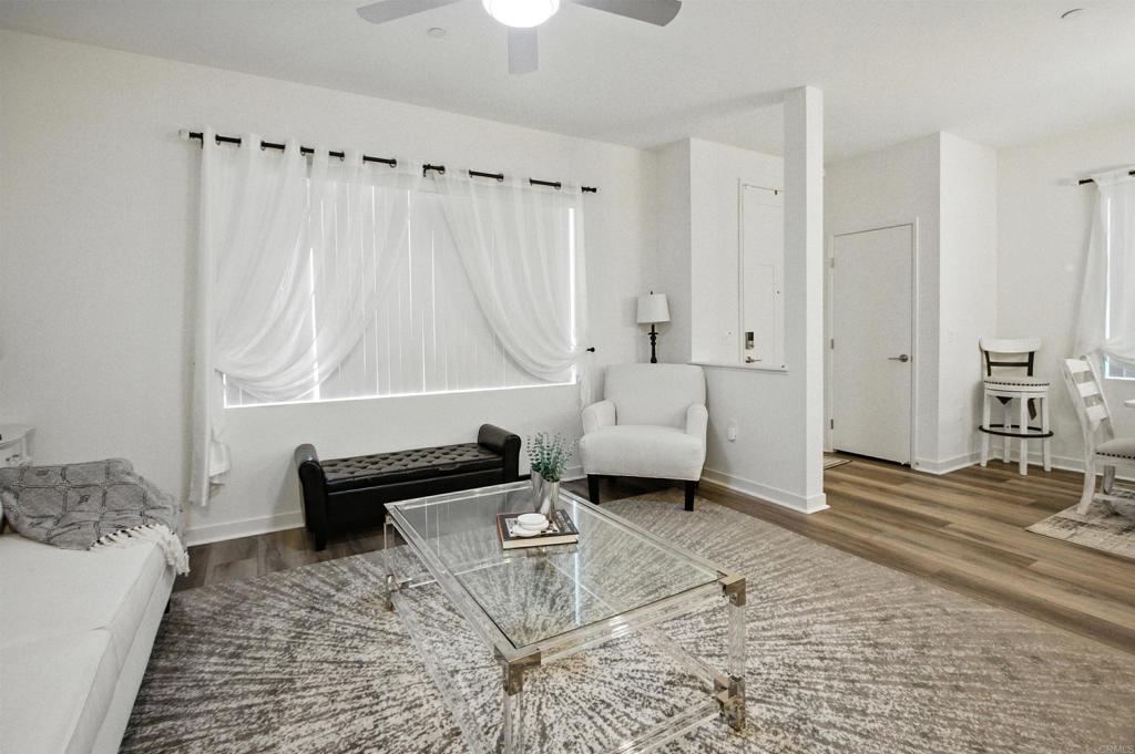 332 Seedling Way Fallbrook, CA 92028 - Photo 10 of 37 a living room with furniture and a rug