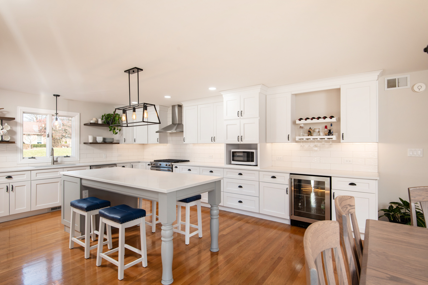 13530 South Monaghan Road Homer Glen, IL 60491 - Photo 11 of 45 a kitchen with a stove cabinets and wooden floor