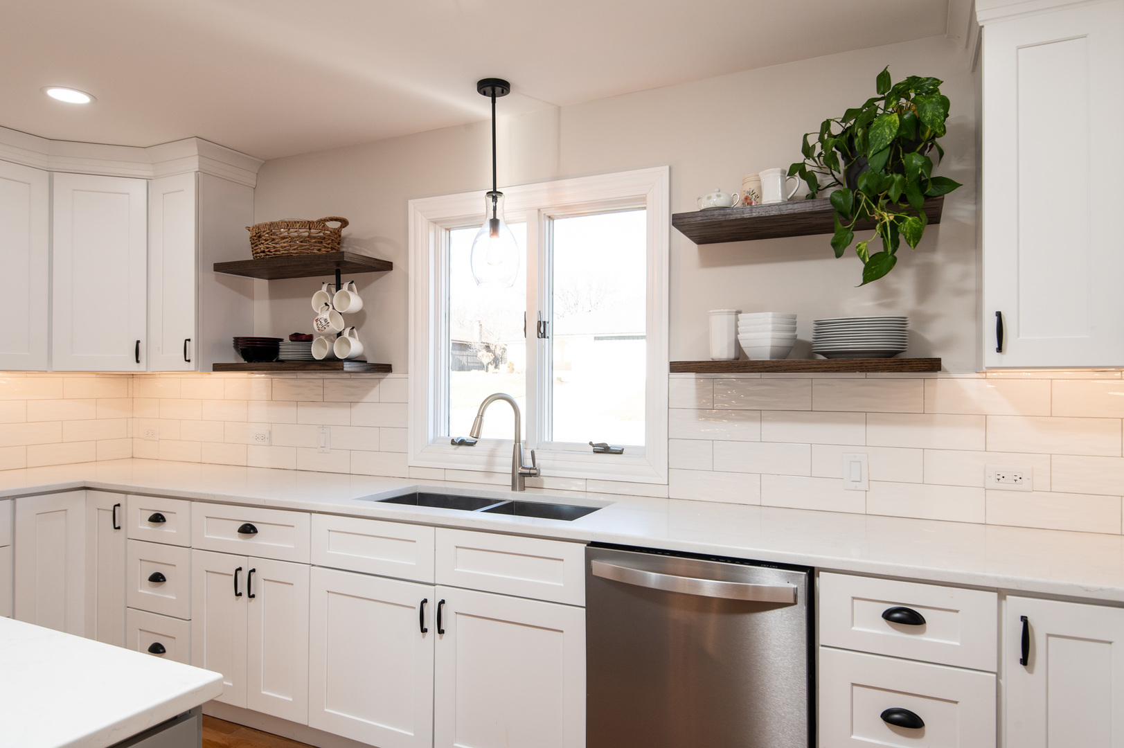 13530 South Monaghan Road Homer Glen, IL 60491 - Photo 14 of 45 a kitchen with stainless steel appliances a sink a stove and a wooden floor
