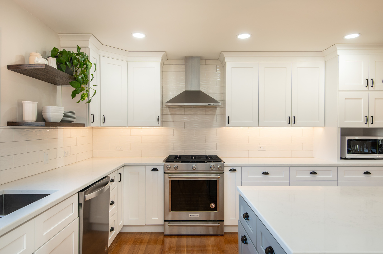 13530 South Monaghan Road Homer Glen, IL 60491 - Photo 15 of 45 a kitchen with granite countertop white cabinets and white appliances