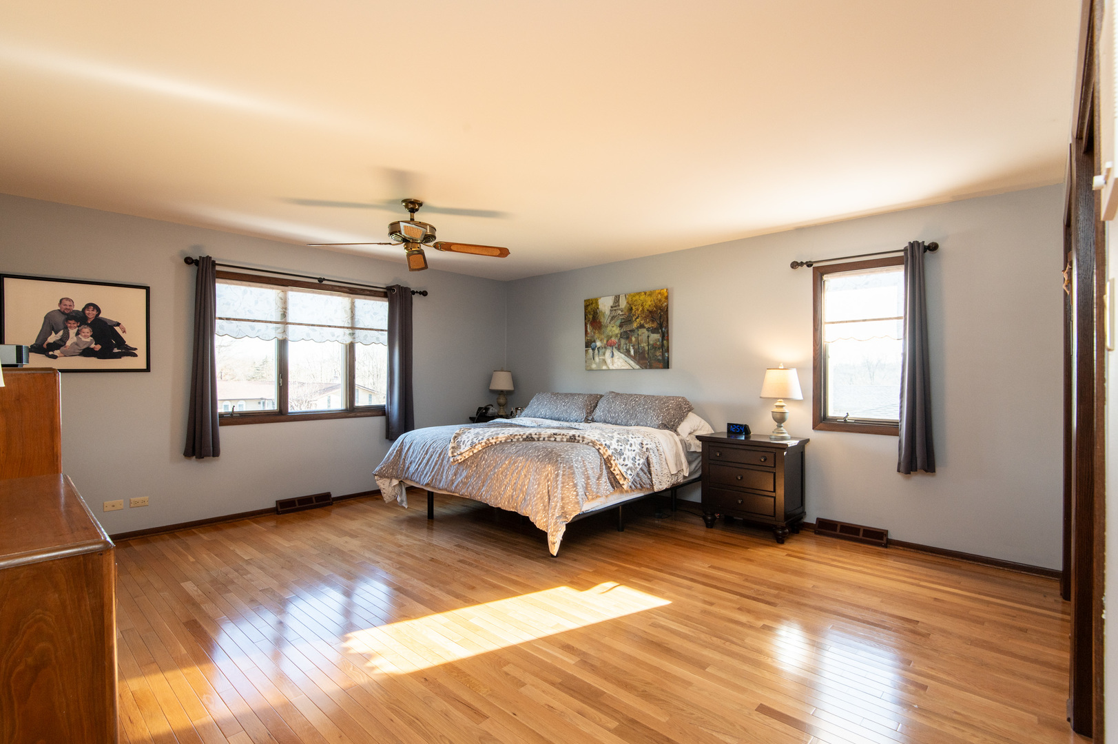 13530 South Monaghan Road Homer Glen, IL 60491 - Photo 18 of 45 a bed sitting in a spacious bedroom next to a window