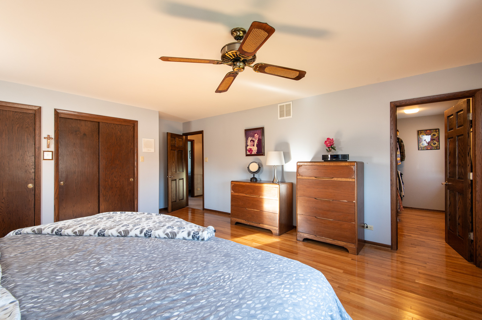 13530 South Monaghan Road Homer Glen, IL 60491 - Photo 19 of 45 a bedroom with a bed and a chandelier