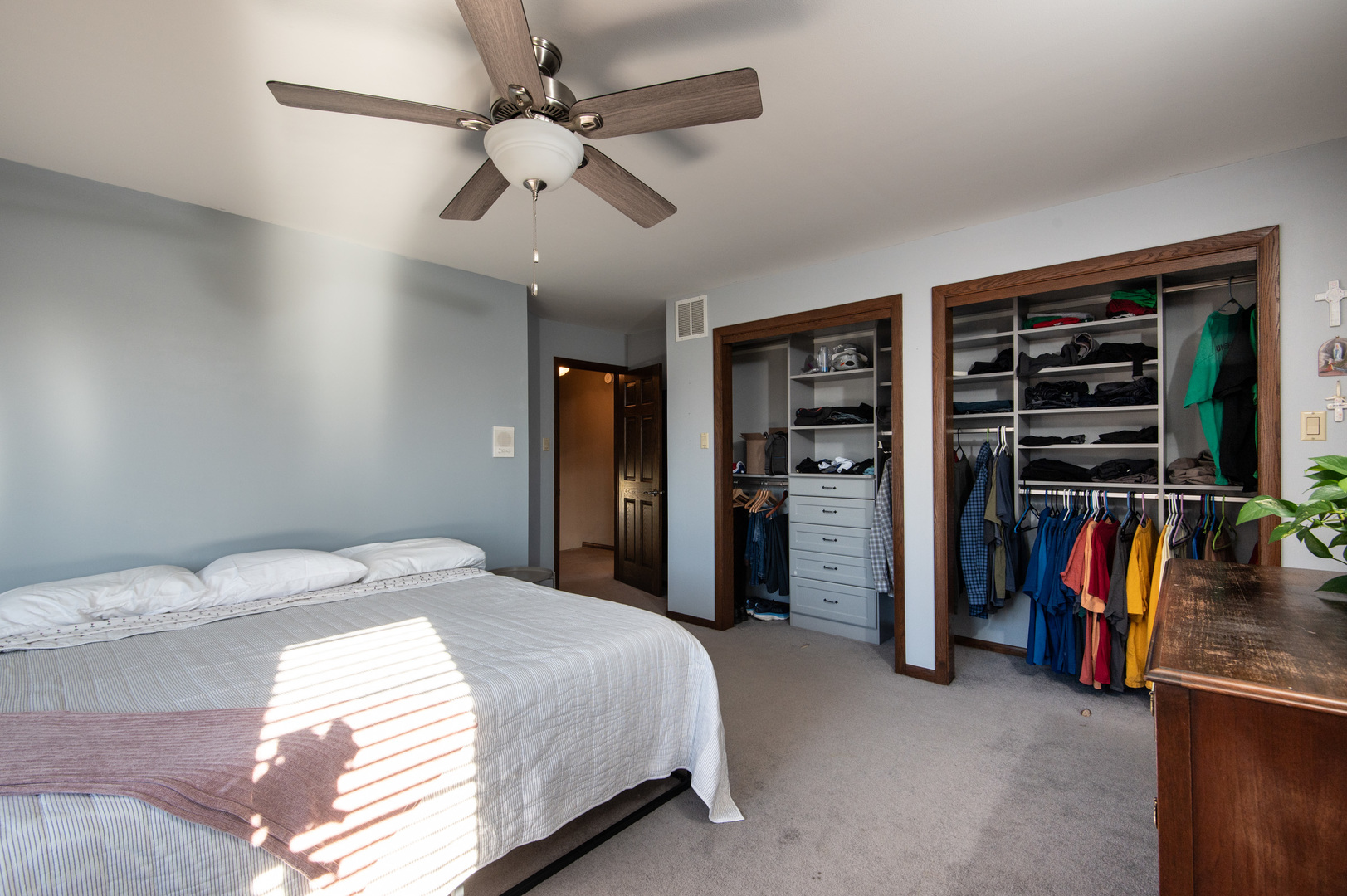 13530 South Monaghan Road Homer Glen, IL 60491 - Photo 20 of 45 a bedroom with a bed and a walk in closet