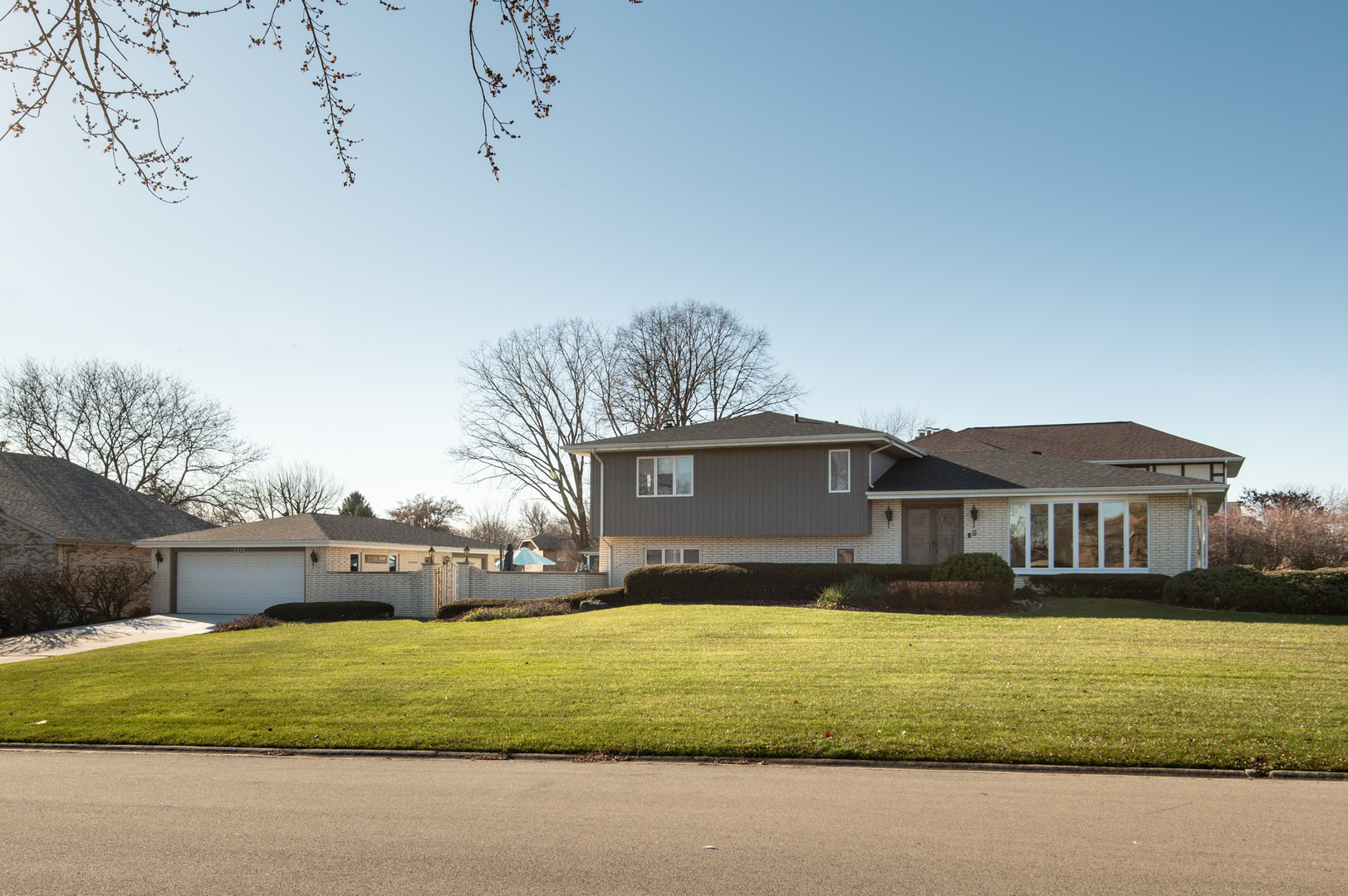 13530 South Monaghan Road Homer Glen, IL 60491 - Photo 2 of 45 a front view of a house with a yard