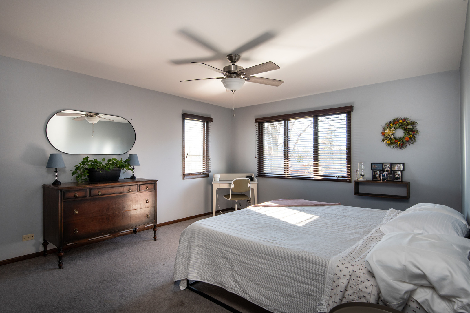 13530 South Monaghan Road Homer Glen, IL 60491 - Photo 21 of 45 a bedroom with a bed and a chandelier