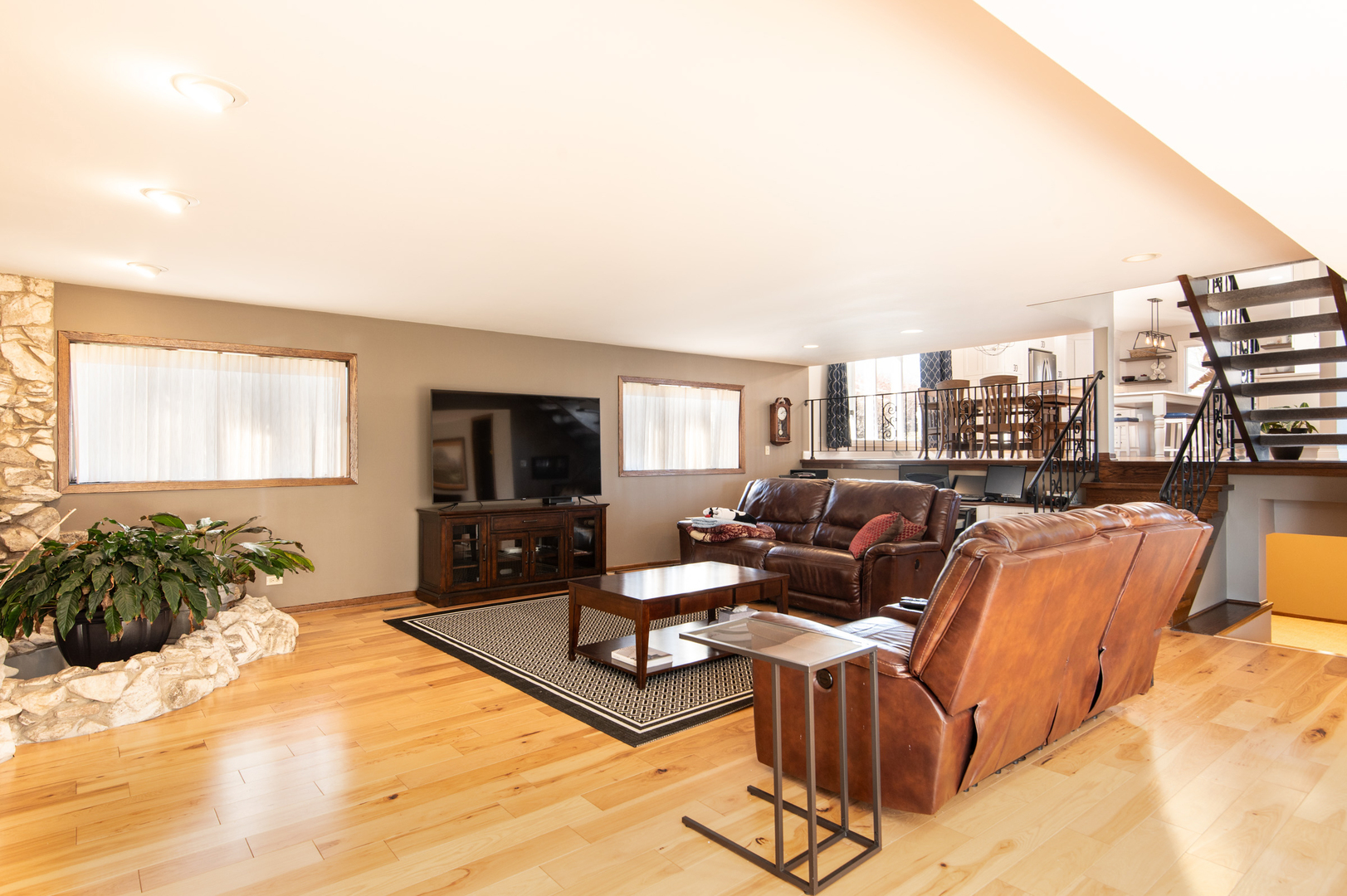 13530 South Monaghan Road Homer Glen, IL 60491 - Photo 27 of 45 a living room with furniture and a flat screen tv