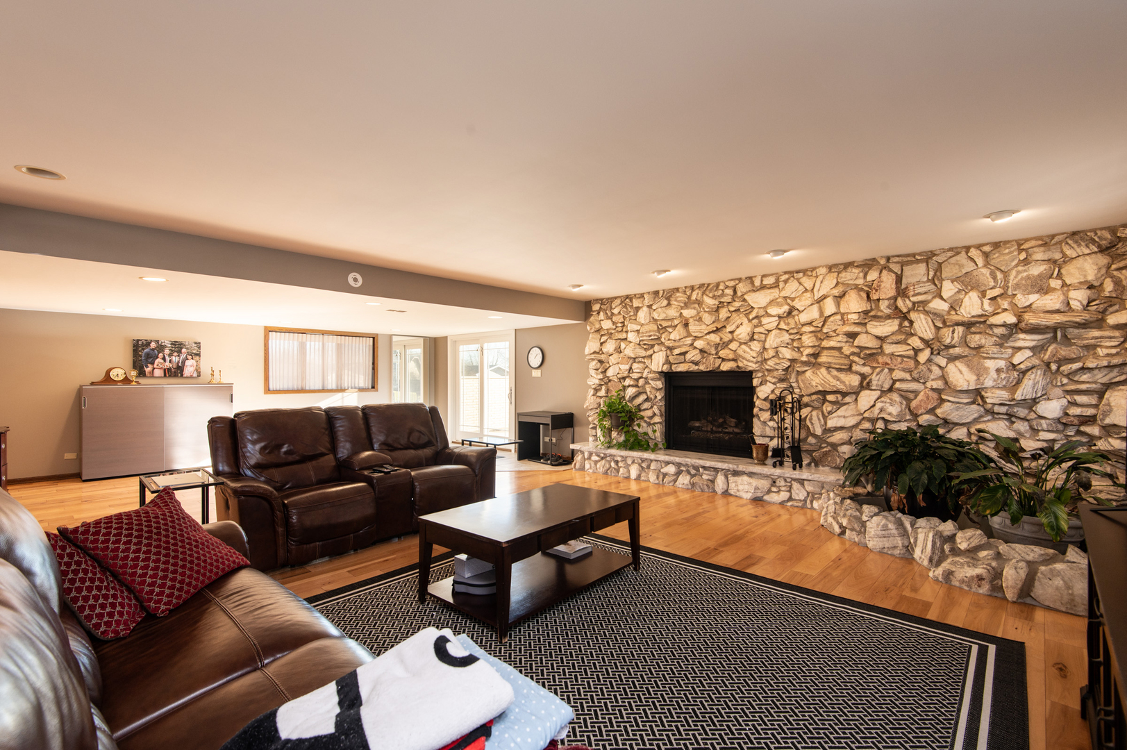 13530 South Monaghan Road Homer Glen, IL 60491 - Photo 28 of 45 a living room with furniture and a flat screen tv