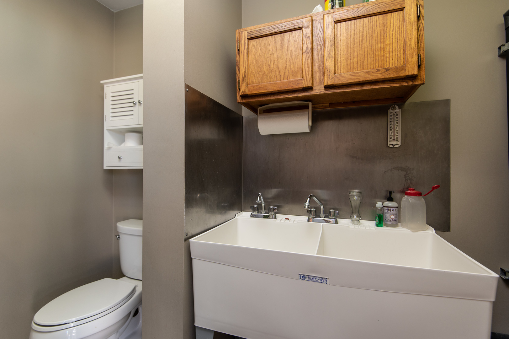 13530 South Monaghan Road Homer Glen, IL 60491 - Photo 39 of 45 a bathroom with a sink a toilet and a mirror