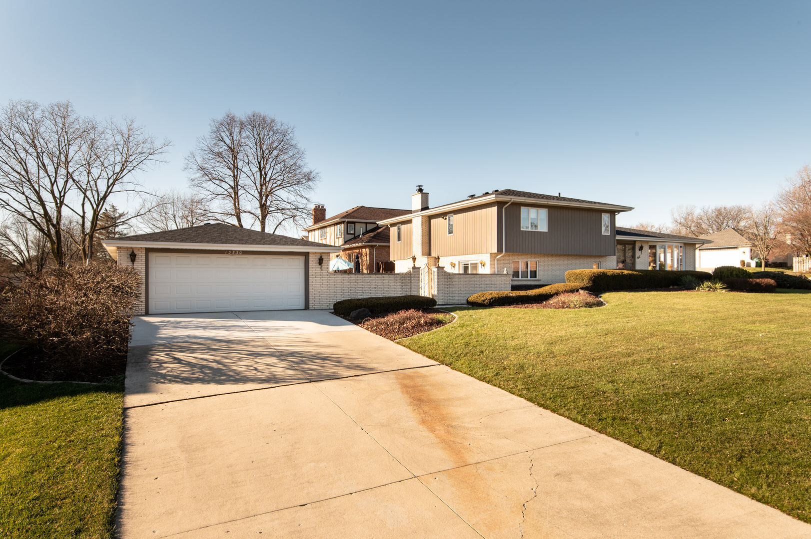 13530 South Monaghan Road Homer Glen, IL 60491 - Photo 4 of 45 a house with yard and trees in front of it