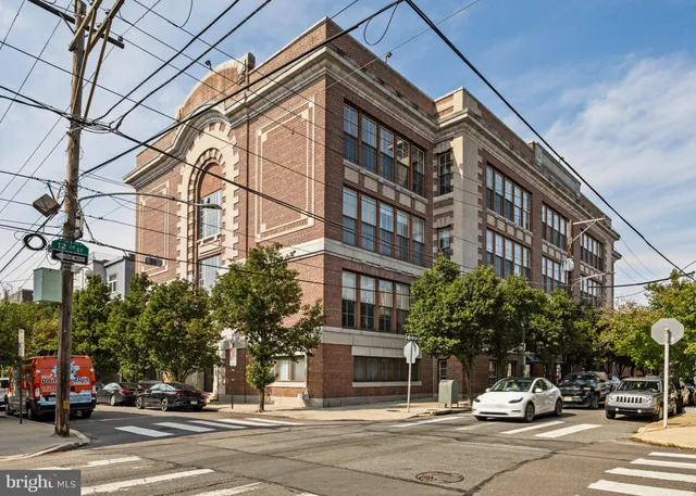 a view of a building and a street