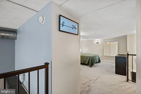 a bedroom with a bed and a walk in closet