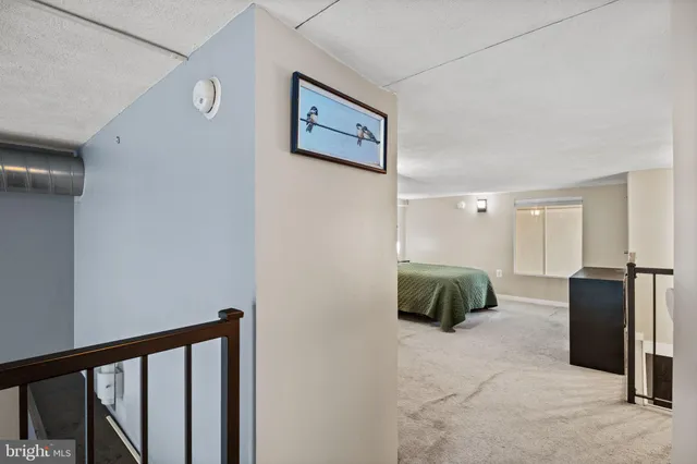 a bedroom with a bed and a walk in closet