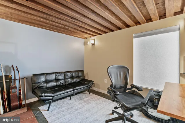 a view of workspace with lounge chair