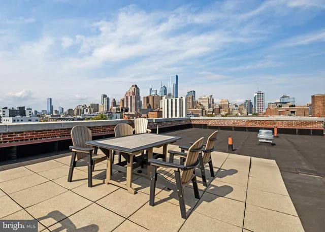 a terrace with a city view