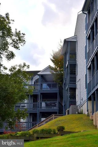 a view of a building with a swimming pool
