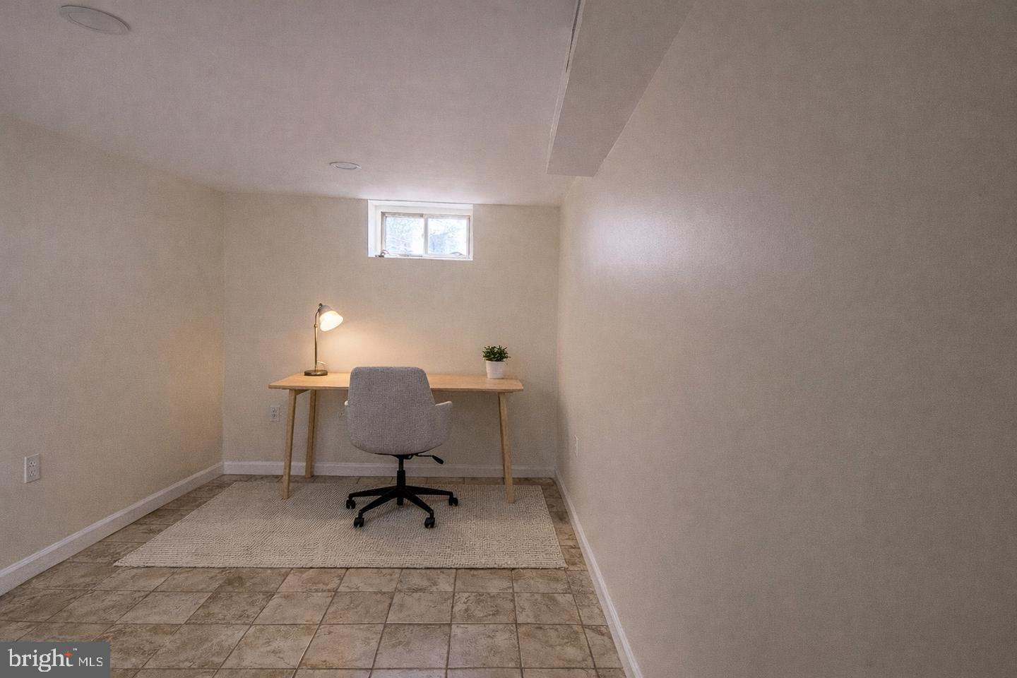 306 Cambridge Road Cherry Hill, NJ 08034 - Photo 11 of 13 a view of a workspace with furniture and a window
