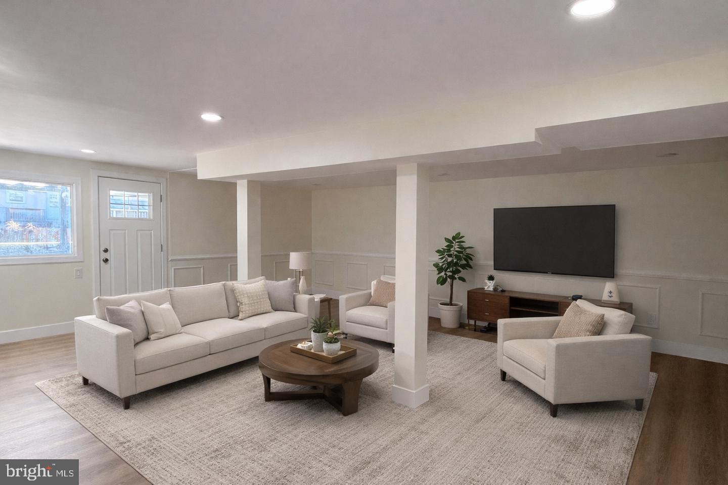 306 Cambridge Road Cherry Hill, NJ 08034 - Photo 7 of 13 a living room with furniture and a flat screen tv