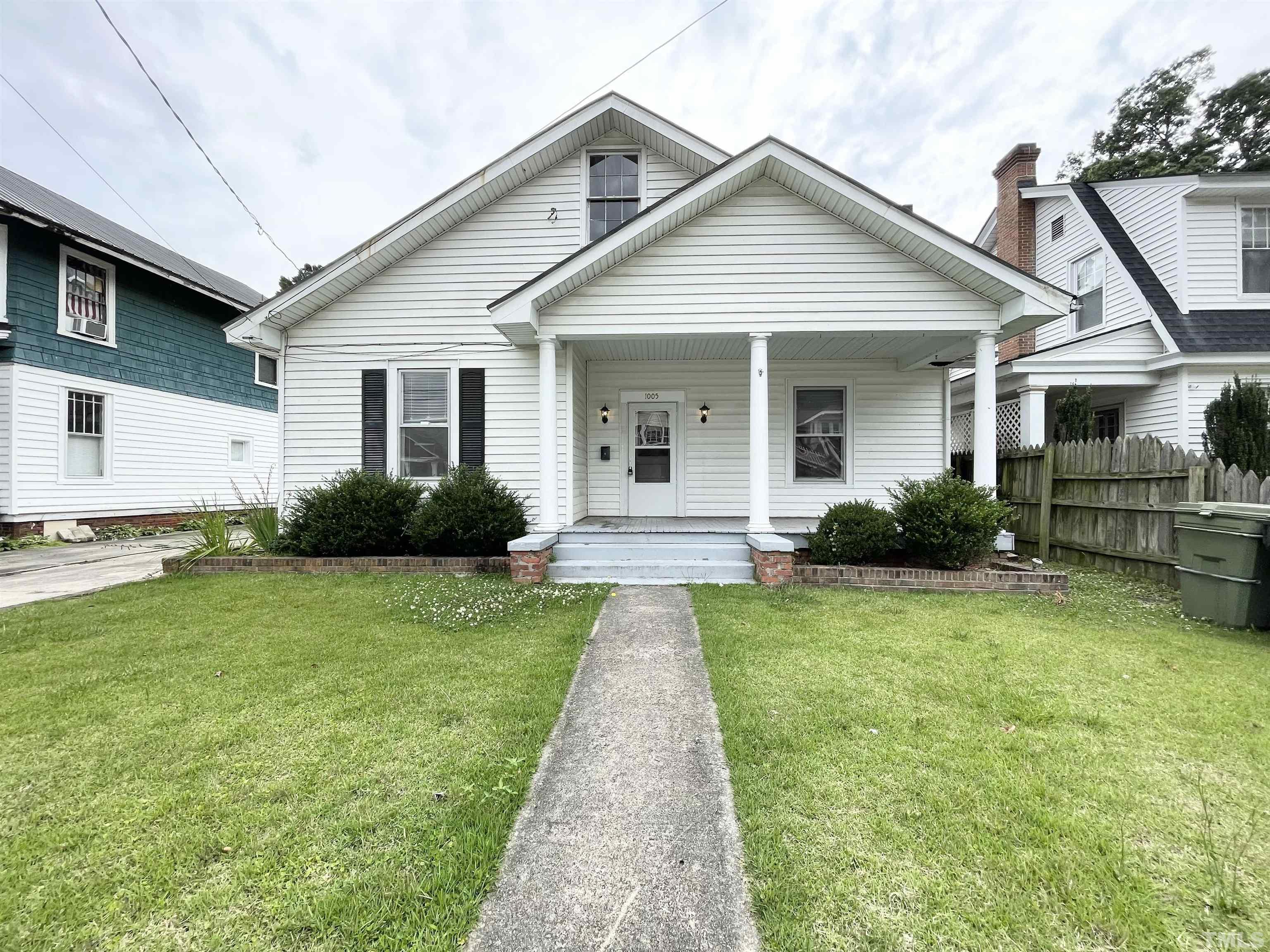 1005 Anderson Street Northwest Wilson, NC 27893 - Photo 1 of 16 a view of a yard in front of house