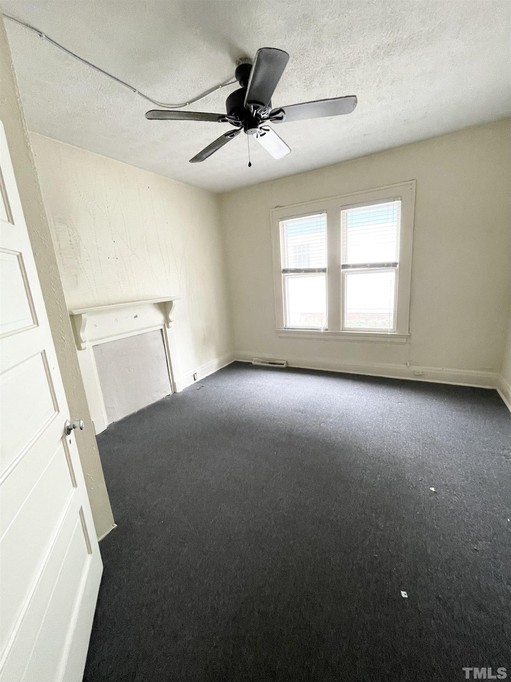 1005 Anderson Street Northwest Wilson, NC 27893 - Photo 11 of 16 a view of an empty room with a window