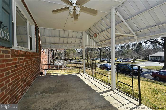 1005 Forest Glen Road Silver Spring, MD 20901 - Photo 15 of 26 a view of a porch with a couch
