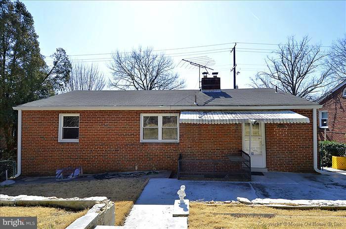 1005 Forest Glen Road Silver Spring, MD 20901 - Photo 23 of 26 a view of a house with roof deck