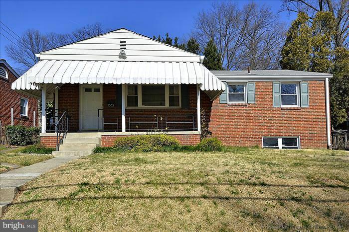 1005 Forest Glen Road Silver Spring, MD 20901 - Photo 26 of 26 a front view of a house with garden