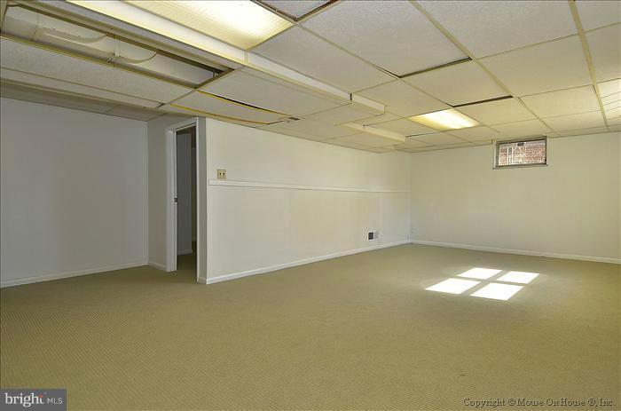 1005 Forest Glen Road Silver Spring, MD 20901 - Photo 7 of 26 a view of an empty room