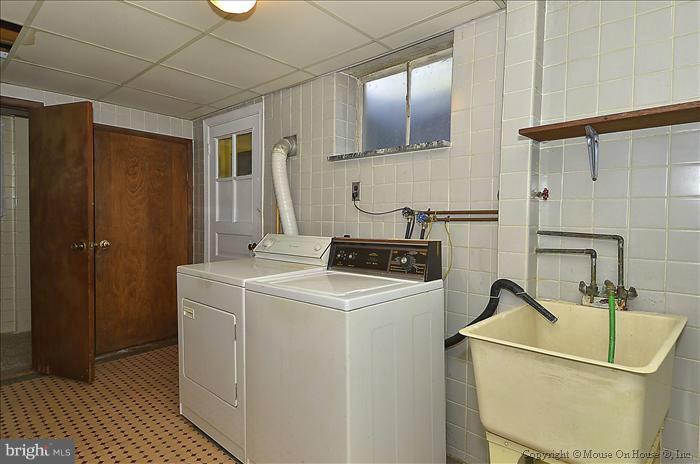 1005 Forest Glen Road Silver Spring, MD 20901 - Photo 8 of 26 a utility room with dryer and washer
