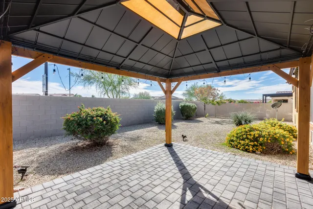 a front view of house with small garden