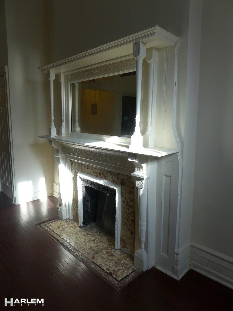 30 Edgecombe Avenue Manhattan, NY 10030 - Photo 5 of 16 a view of a livingroom with a fireplace
