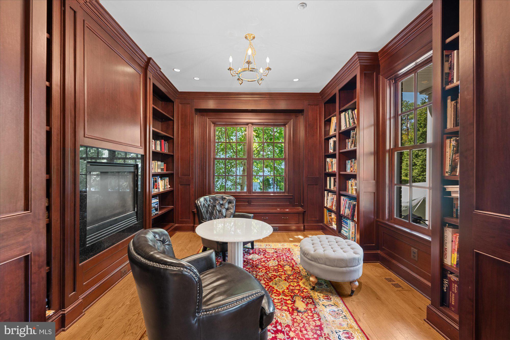 1701 South Arlington Ridge Road Arlington, VA 22202 - Photo 36 of 90 Wood-paneled Library with two-sided fireplace