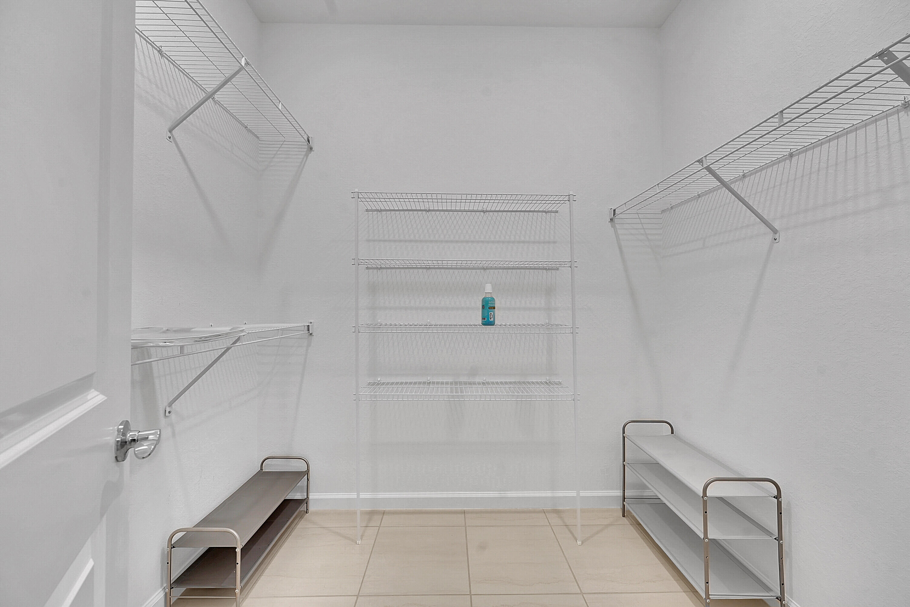 9765 Southwest Meridian Way Stuart, FL 34997 - Photo 16 of 46 a bathroom with a shower