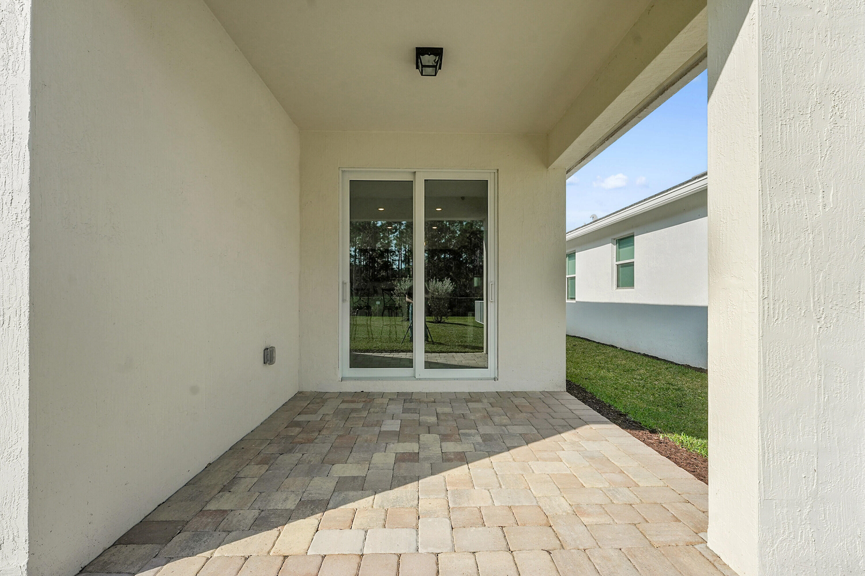 9765 Southwest Meridian Way Stuart, FL 34997 - Photo 27 of 46 a view of a front door of a house