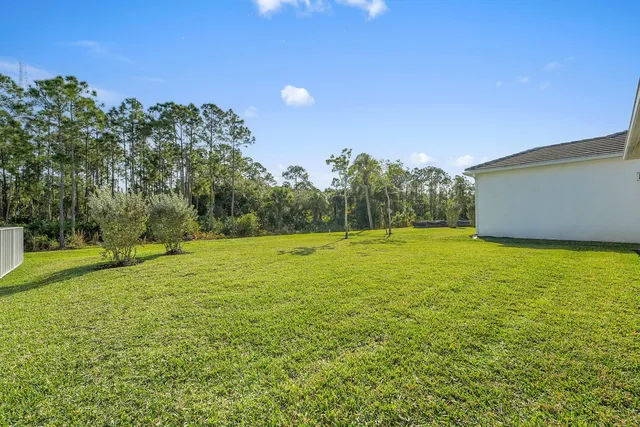 a house view with a garden space