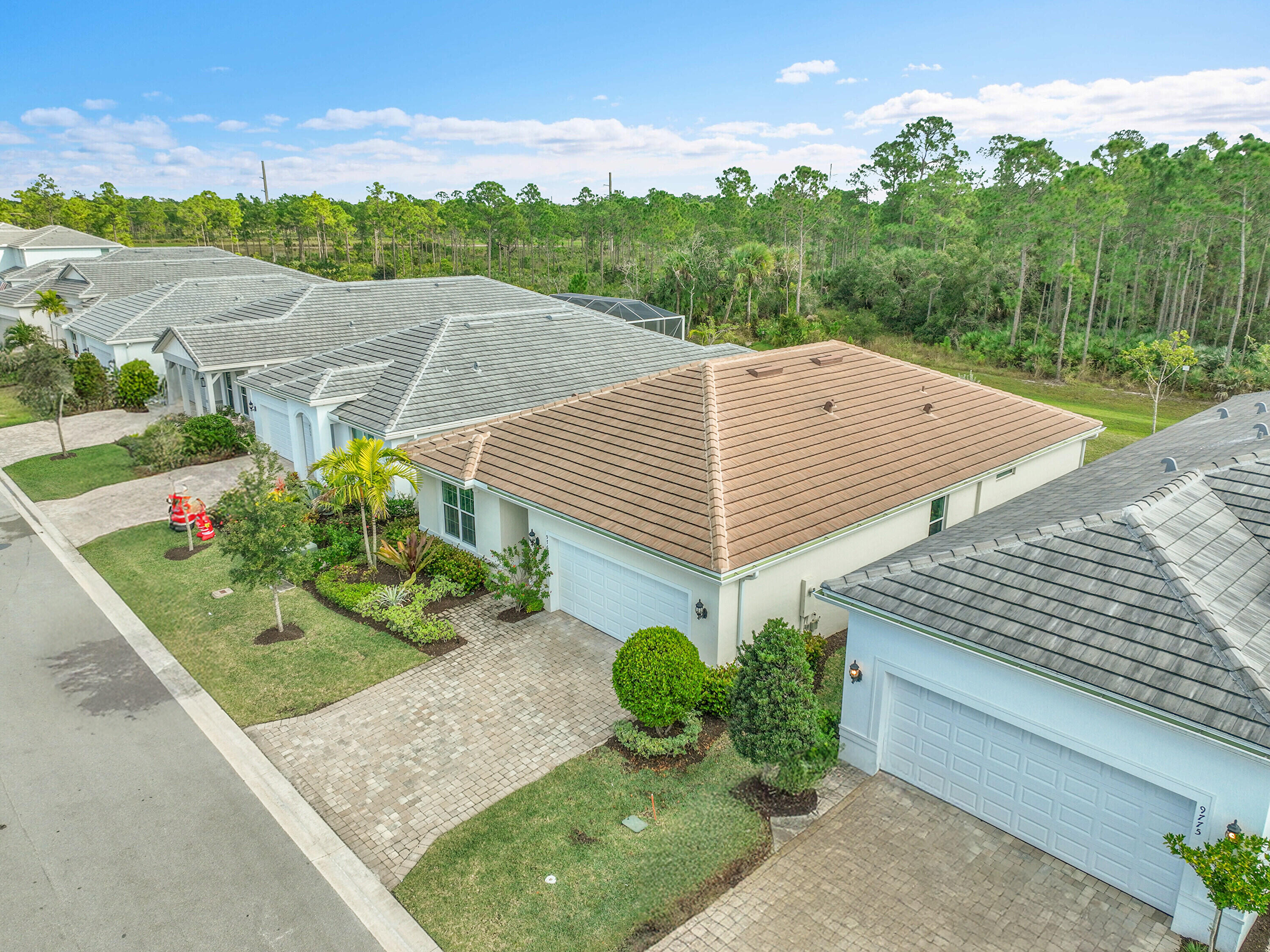 9765 Southwest Meridian Way Stuart, FL 34997 - Photo 32 of 46 a view of a back yard of the house