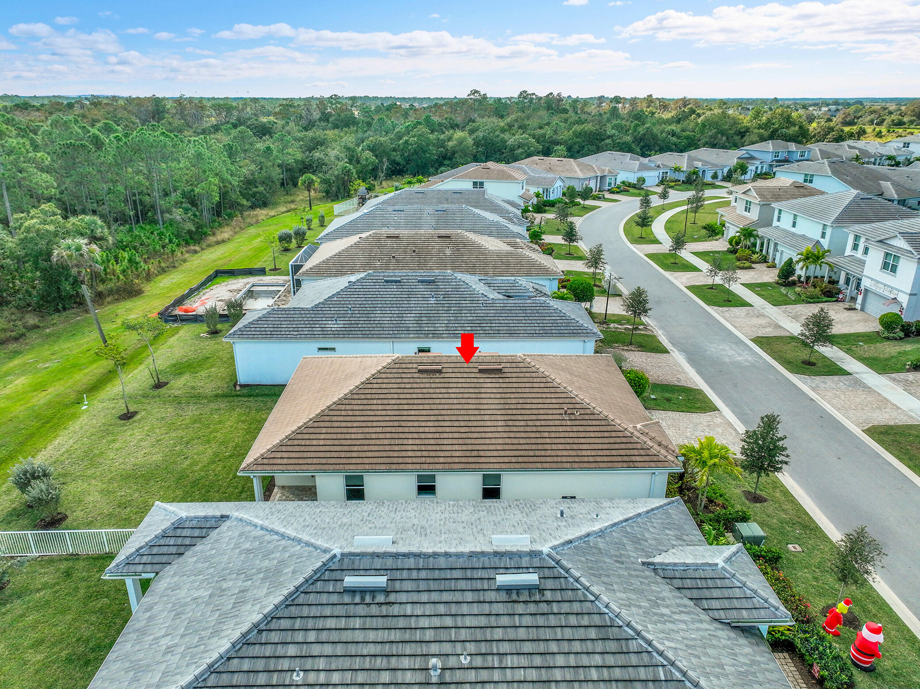 9765 Southwest Meridian Way Stuart, FL 34997 - Photo 35 of 46 an aerial view of a house
