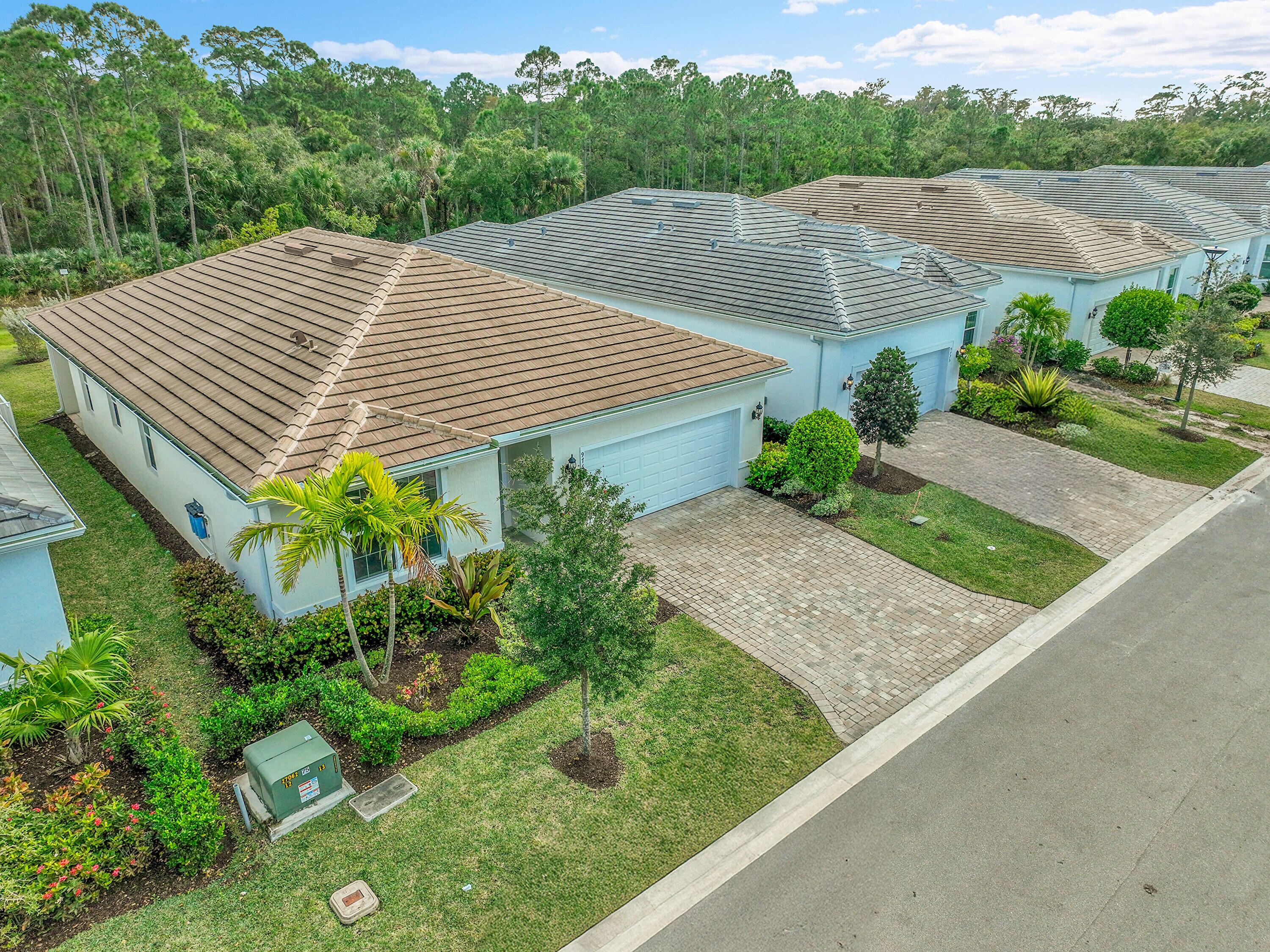 9765 Southwest Meridian Way Stuart, FL 34997 - Photo 36 of 46 a view of a backyard with plants