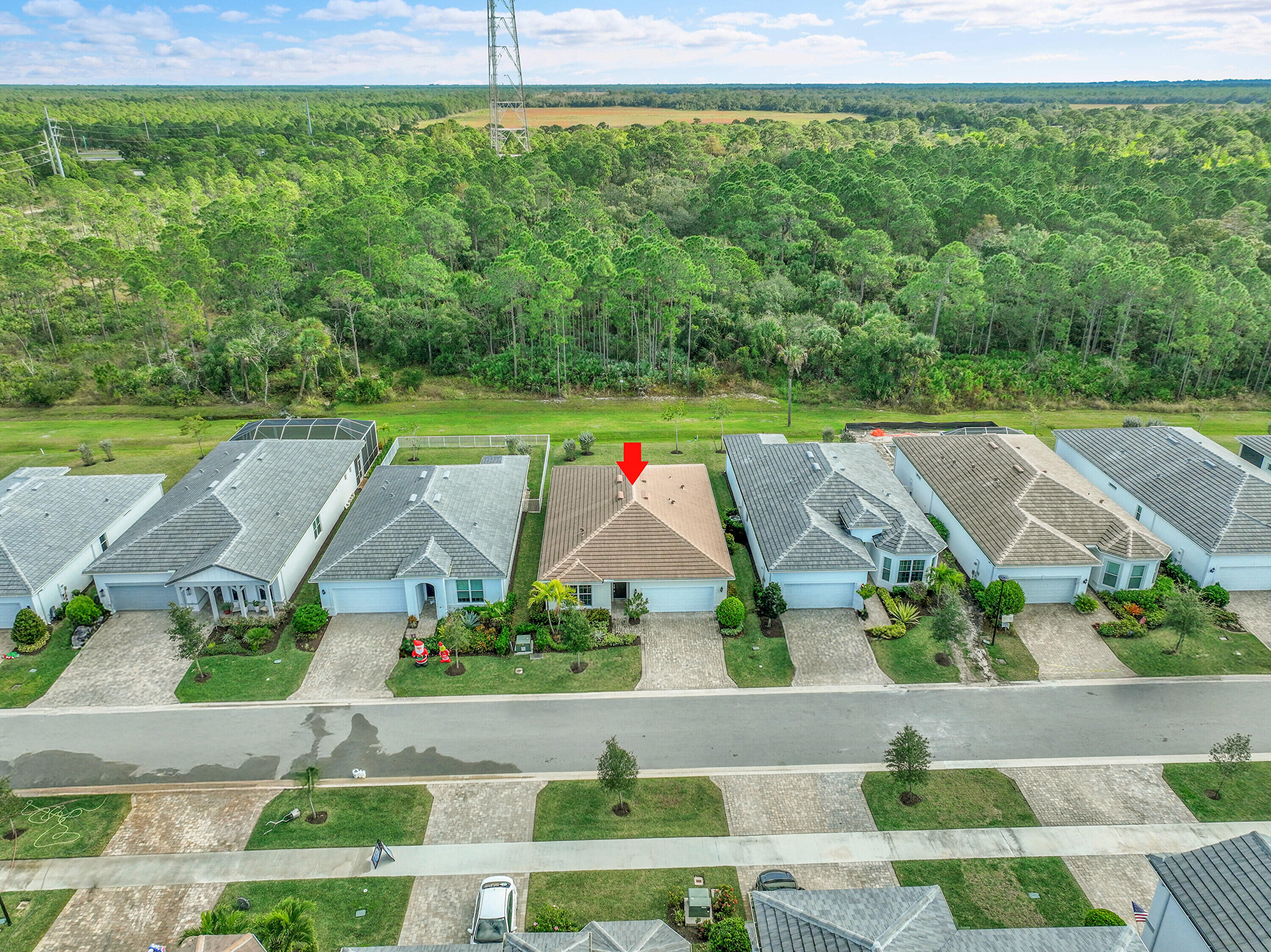 9765 Southwest Meridian Way Stuart, FL 34997 - Photo 37 of 46 an aerial view of a house with a garden