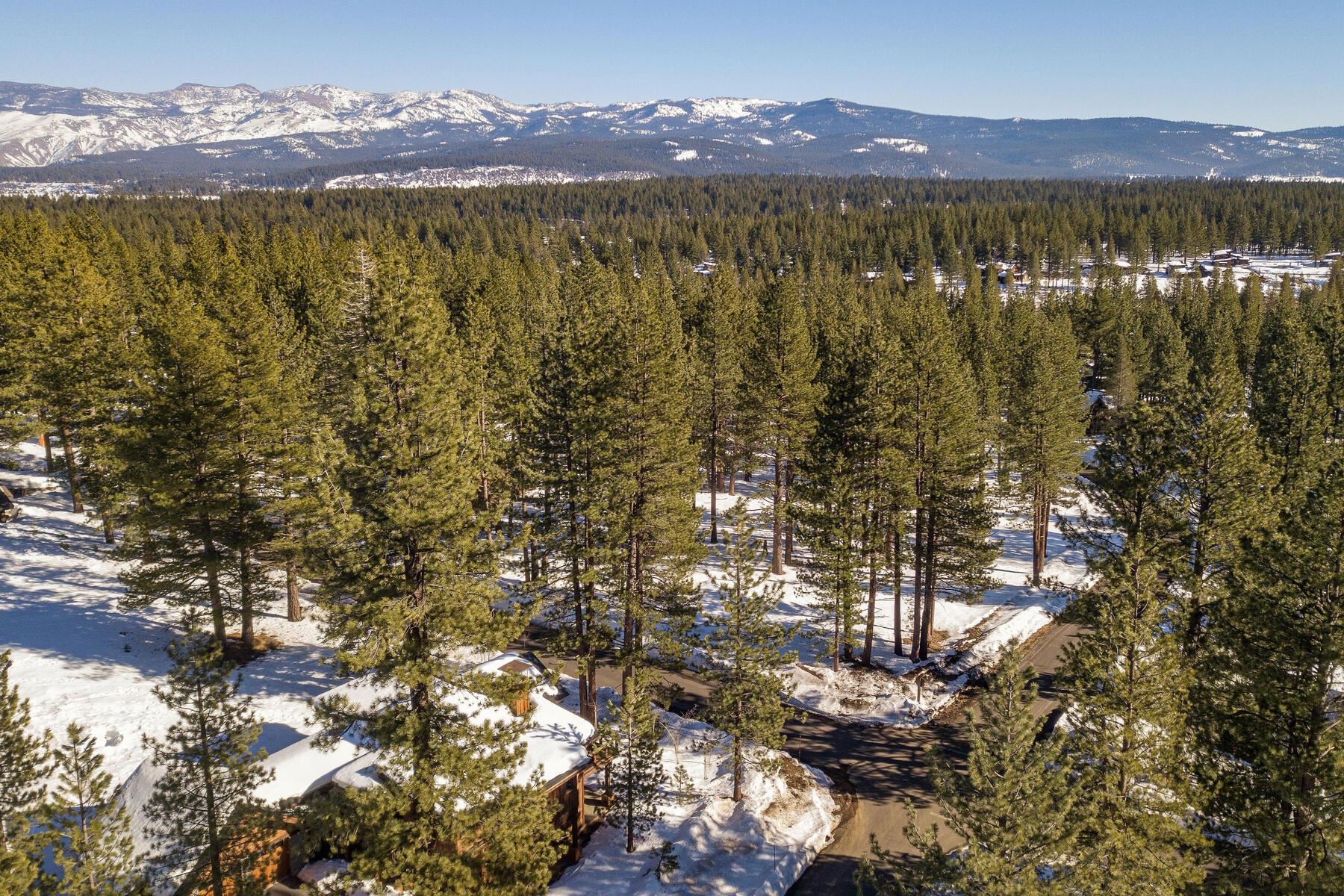 11651 Bottcher Loop Truckee, CA 96161 - Photo 1 of 17 a view of a city with mountains in the background