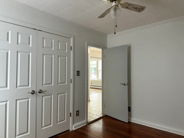 a bathroom with a toilet and a bathtub