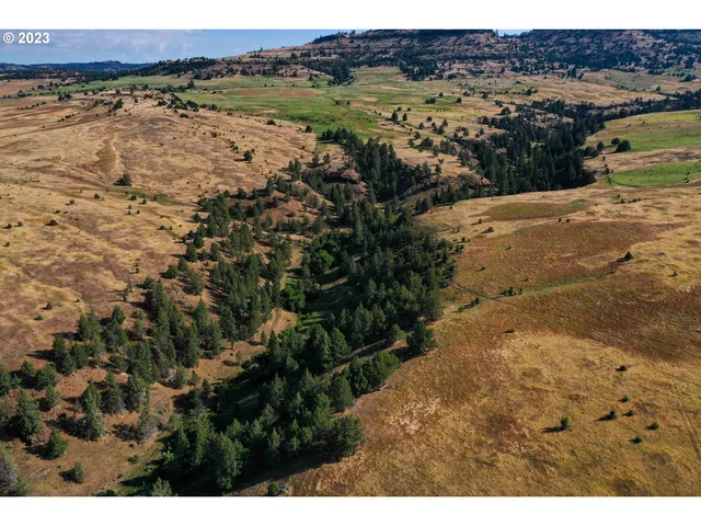 a view of a lake with mountain