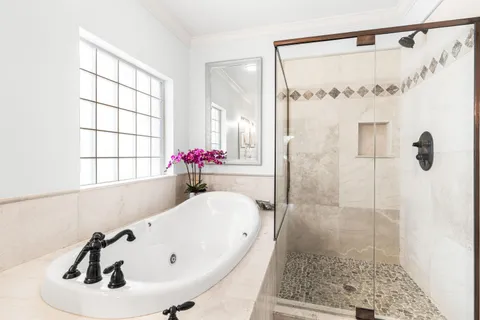 a bathroom with a sink and a shower