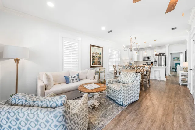 a living room with furniture and a table