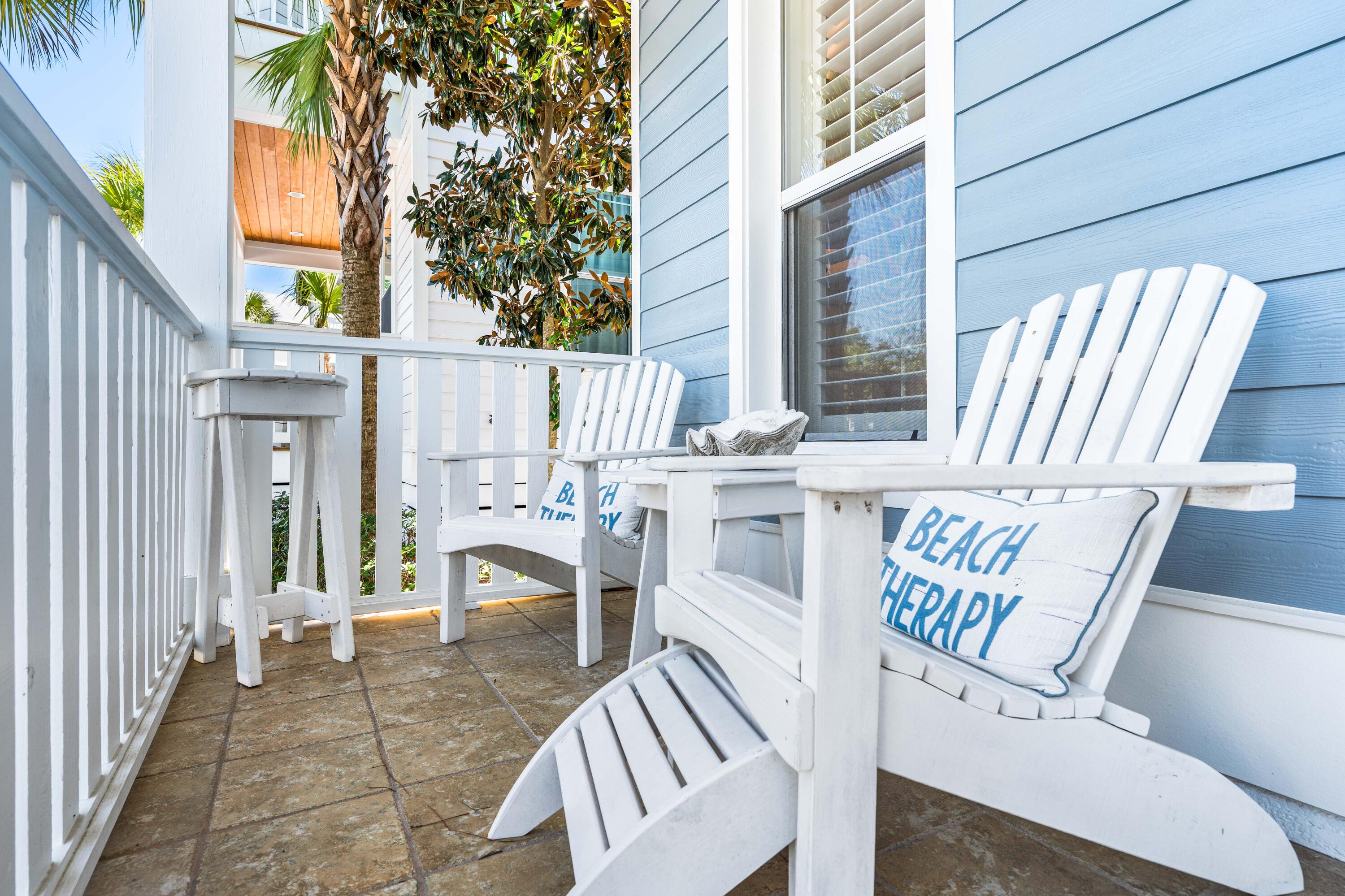 59 Endless Summer Way West Inlet Beach, FL 32461 - Photo 32 of 40 a view of a patio with a table and chairs