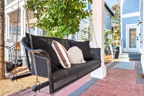 a view of balcony with furniture